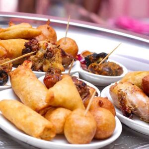2 puff puff, 1 meat pie, 1 spring roll and 1chicken $7.50