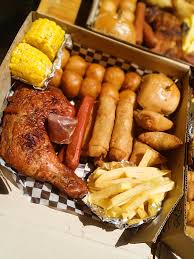 2 puff puff, 1 meatpie and 1 chicken $6
